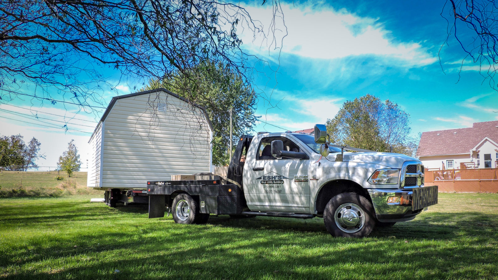 exterior of truck and shed for delivery for modular cabins for sale article