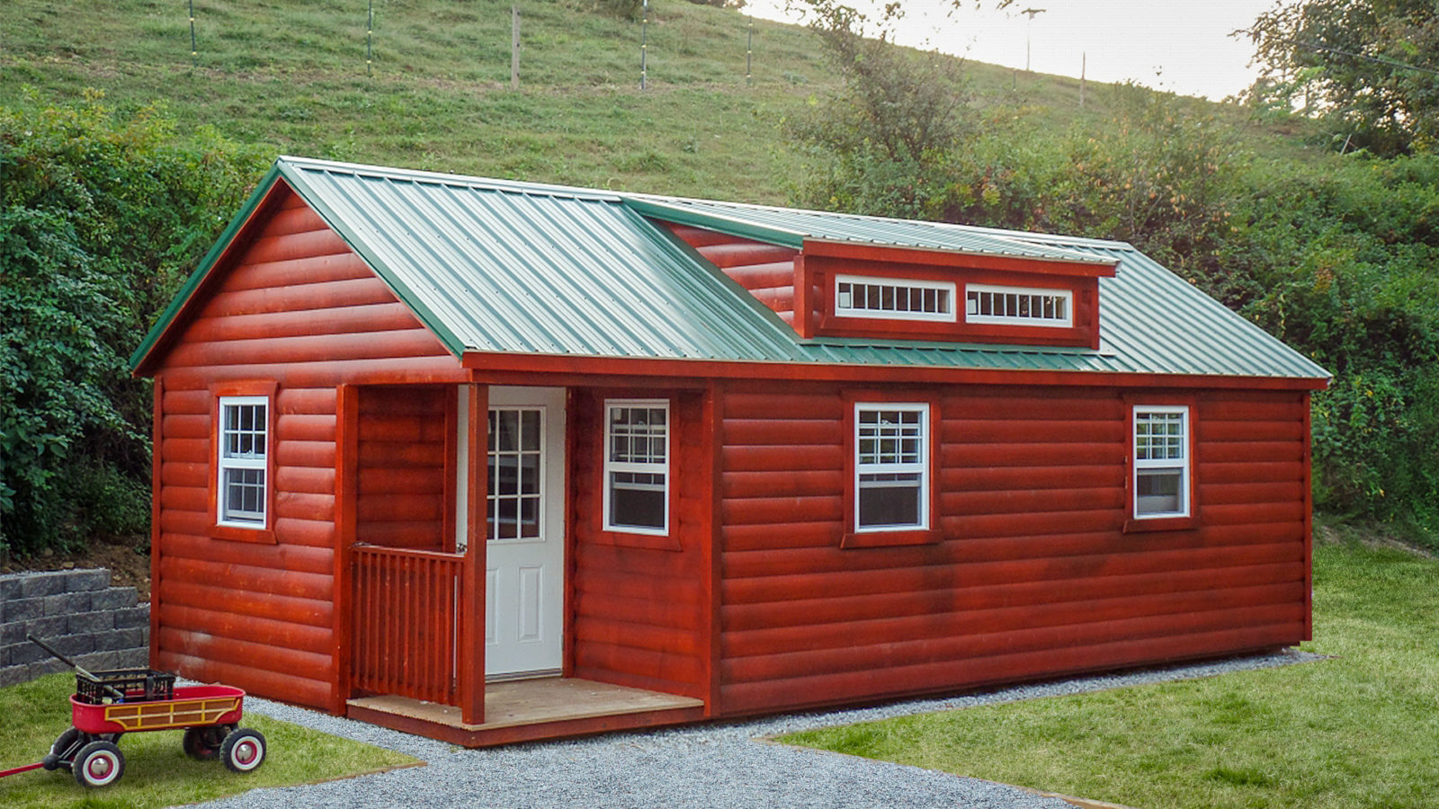 exterior of red shed with porch for sale near KY and TN