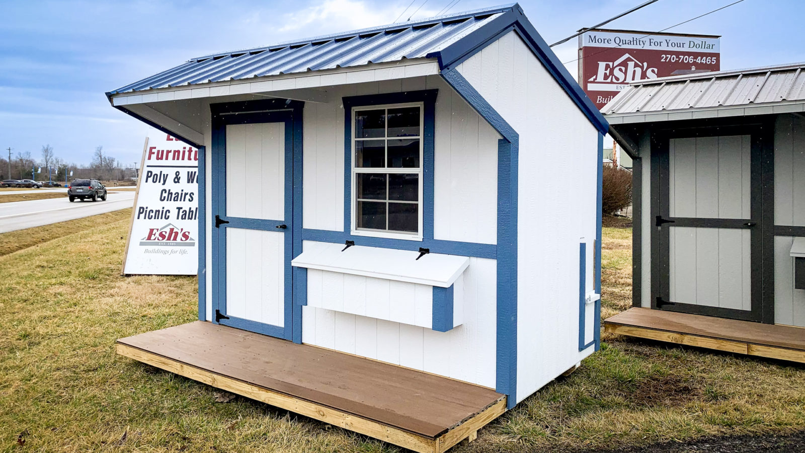exterior of white and blue chicken coop for sale