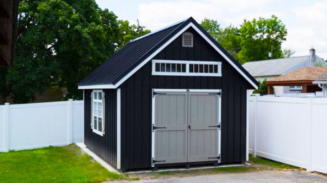 exterior of black and white 12x16 shed for sale