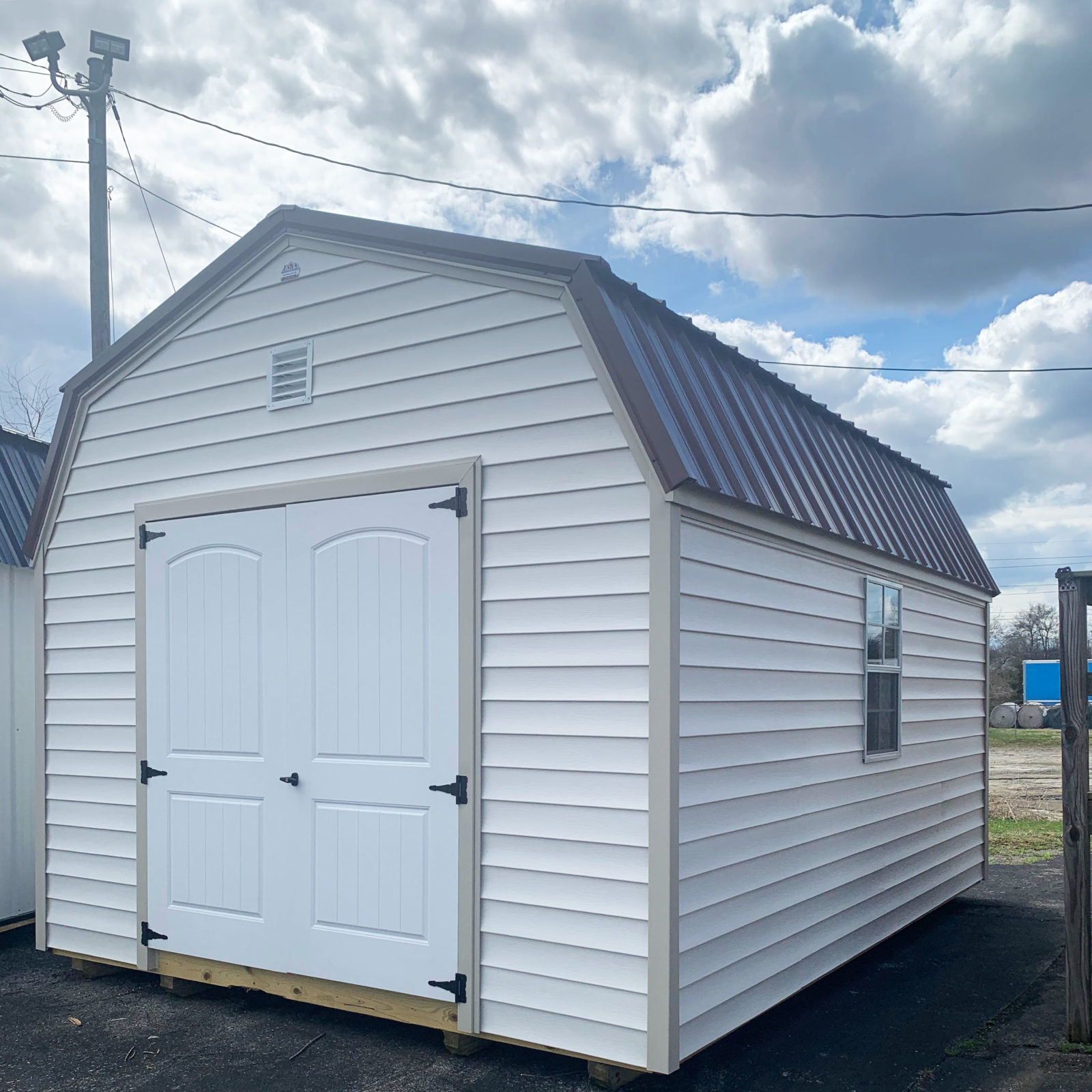 exterior of awesome white 12x16 shed for sale