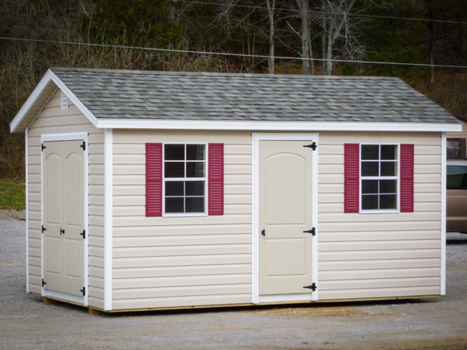 exterior of red-shuttered vinyl shed for sale in KY and TN
