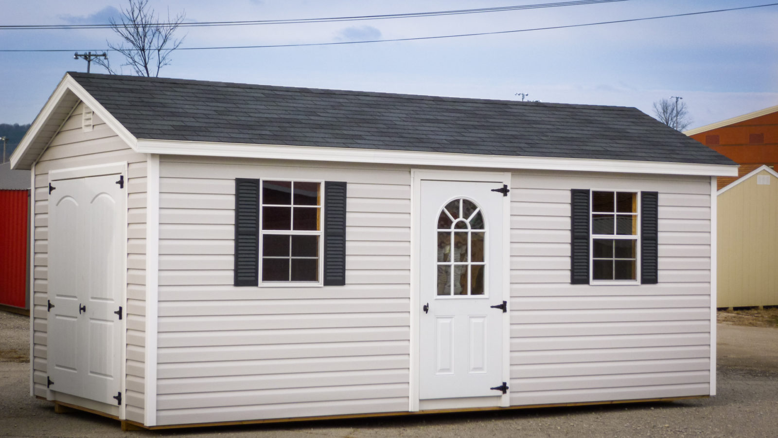 exterior of white ranch large storage shed for sale