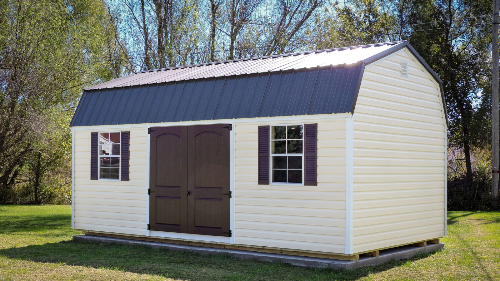 exterior of yellow 14x20 shed for sale