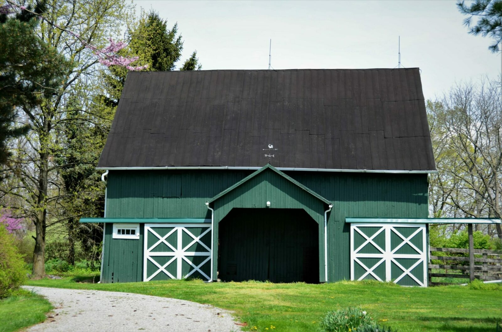 A traditional small horse barn.