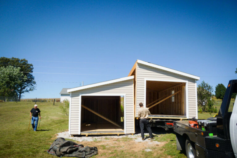 A double wide modular garage being installed.