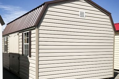 A lofted outdoor shed in Tennessee with vinyl siding