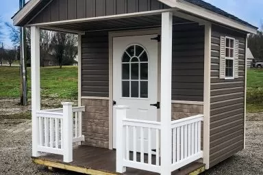 A prefab cabin in Kentucky with a porch
