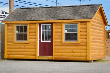 A portable cabin in Kentucky with log siding