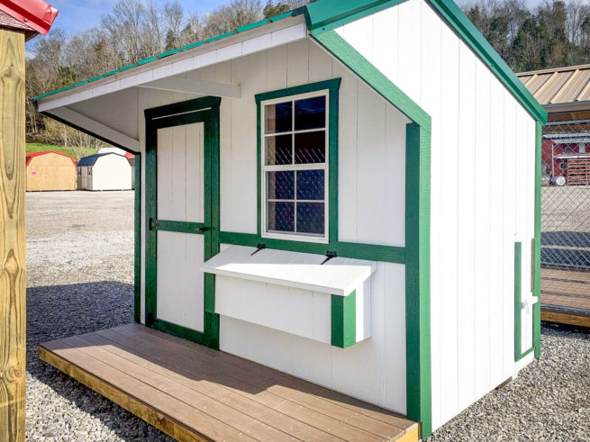 A chicken coop for sale in Tennessee with a porch