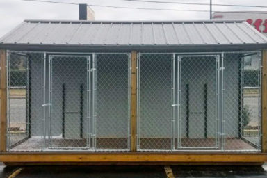 A prefab dog kennel for sale in Tennessee with two dog runs