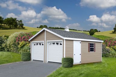 A custom prebuilt garage in Kentucky with vinyl siding and windows