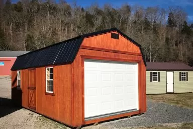 A prebuilt garage in Tennessee with wooden siding and a loft