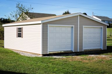 A prefab two-car garage in Tennessee with vinyl siding