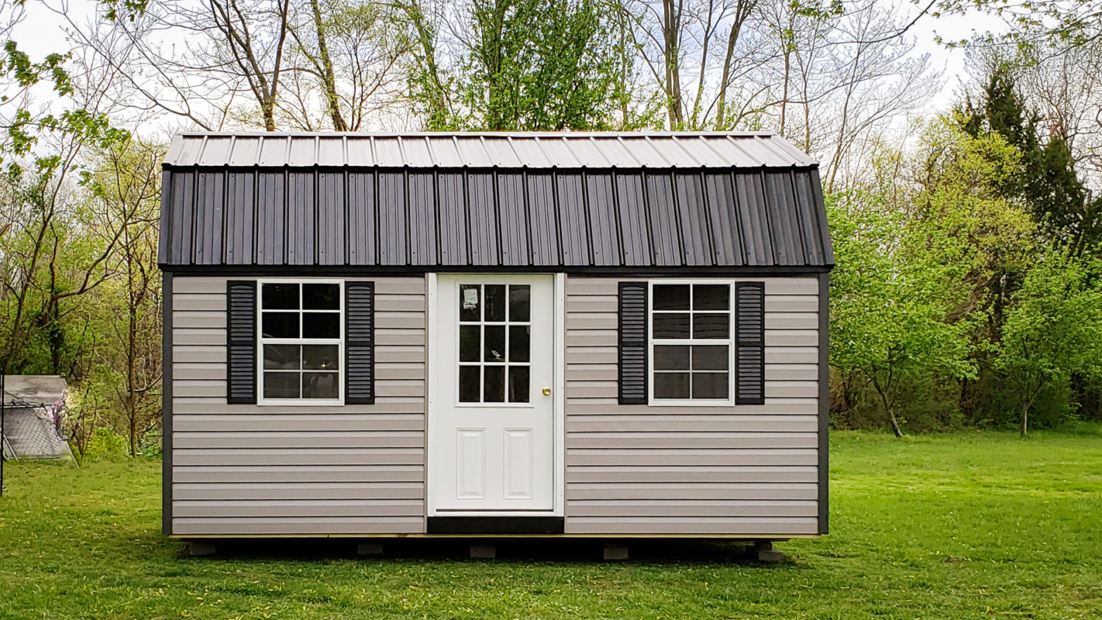 exterior of brown and white shed for sale in KY and TN for outdoor shed cost article
