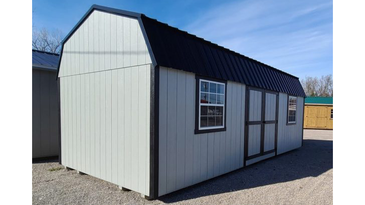 exterior of grey and black high barn for storage building uses for sale in KY and TN